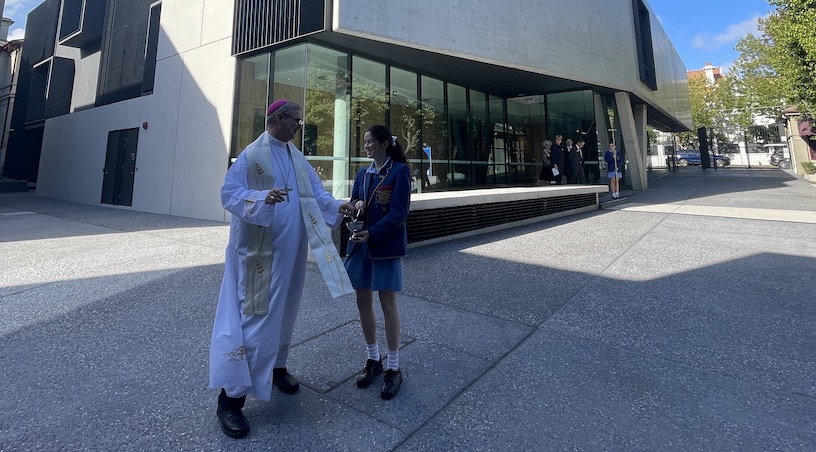 Archbishop Comensoli and Elena Chiam in front of the Clendon Centre